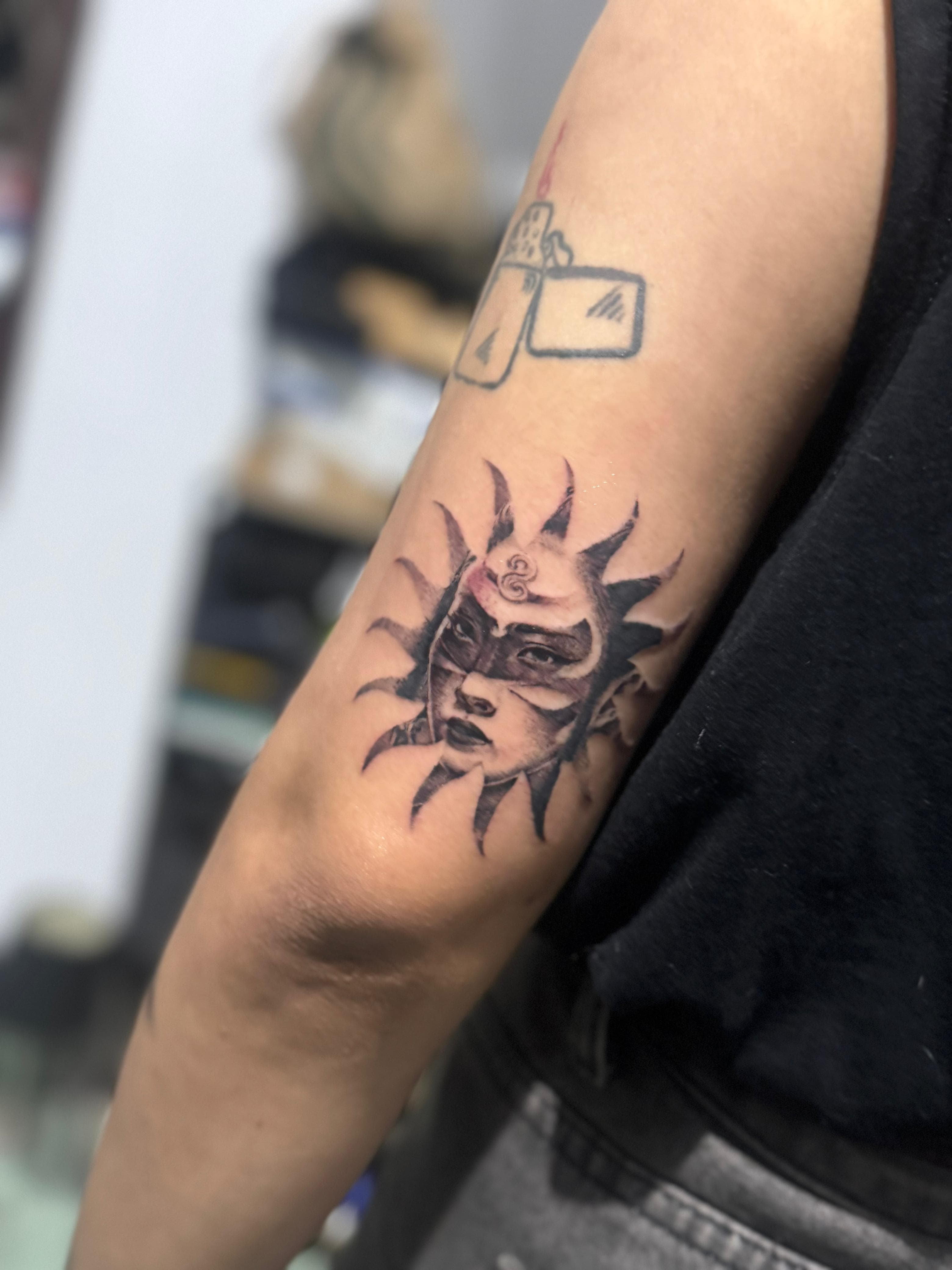 Sun Face Tattoo